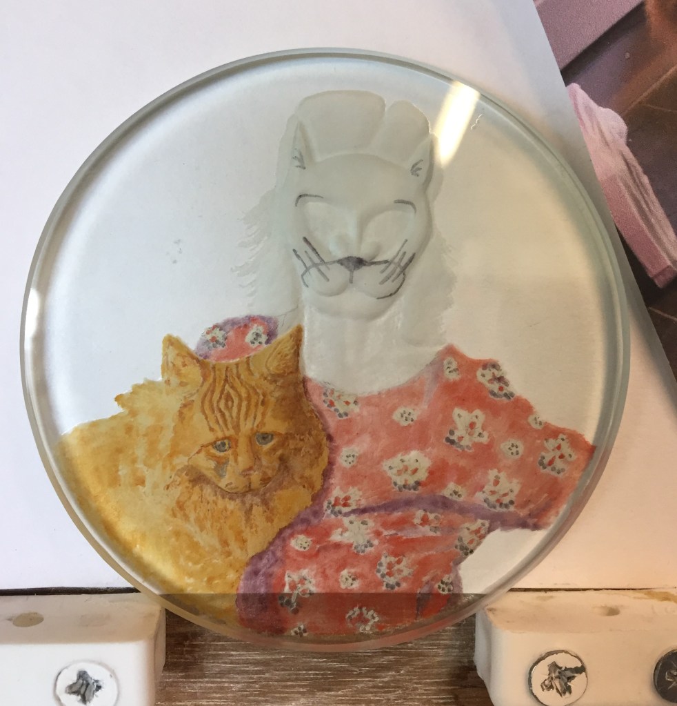 reverse intaglio carvingon flat glass with painting in progress