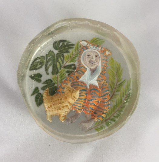 Boy in a Tiger Onesie - Cast glass, engraved and painted with glass enamels using the miniature portraitist's technique onto a dimensional surface