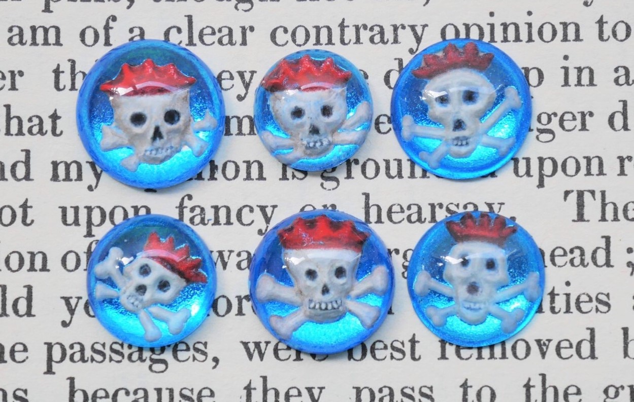 Memento Mori skull crystals. Engraved, cast and enamel painted glass, gilded on the reverse with coloured silver leaf